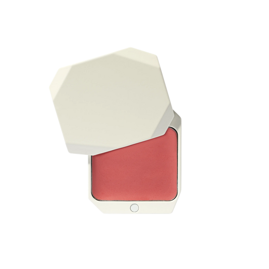 Uoga Uoga cream blush compact in Blooming shade, open with white geometric packaging