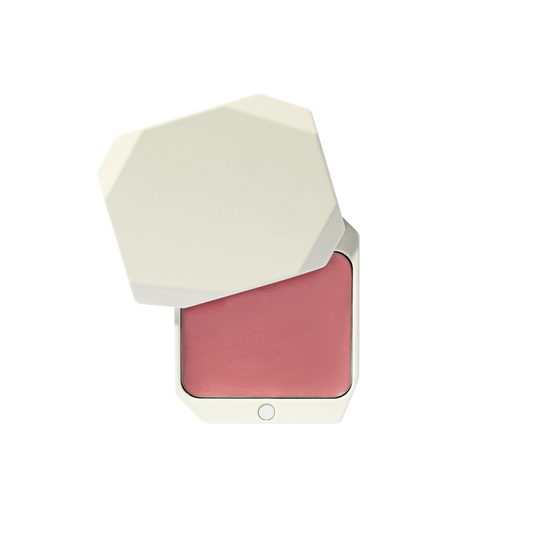 Uoga Uoga cream blush compact in Flirty shade, open with white geometric packaging