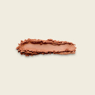 Uoga Uoga 646 Beach Mode Powder texture swatch showcasing terracotta brown colour on a light beige background.