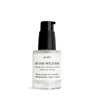Bottle of On The Wild Side anti-blemish serum with pump on a white background.