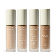 Four bottles of Uoga Uoga BB Creams on a white background