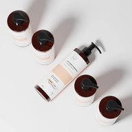 Clemence et Vivien body lotion bottles on a light gray background