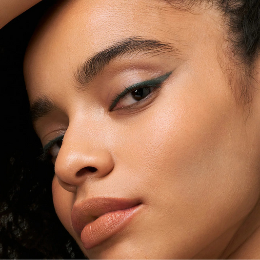 Close-up of person's eye wearing Eclo eyeliner pencil Vert Pin 005 emerald green