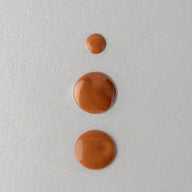 Macro texture of Twelve Beauty Glow Island Body radiance Oil 