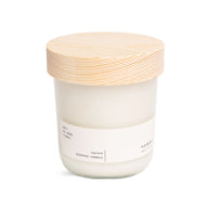 Hetkinen Lapland Candle with a wooden lid on a white background