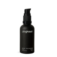 Jungkraut Alpine Performance Face Fluid in a black glass bottle with a nozzle dispenser, displayed on a white background.