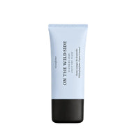 On the Wild Side Light Day Fluid with Hyaluronic Acid in a blue PET tube on a white background