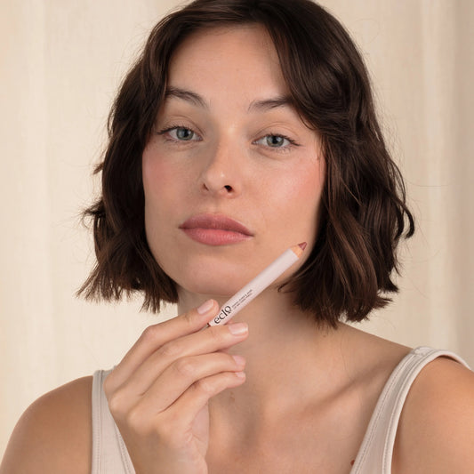 Woman with brown hair wearing Eclo 3-in-1 lip pencil Rosewood 005