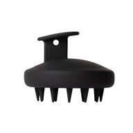 Conscious Botanist black silicone scalp massager brush on white background