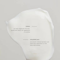 Cream swatch of TEAM DR JOSEPH Hyaluronic Repair Booster Cream highlighting its key actives, guggul and hyaluronic acid