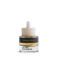 TEAM DR JOSEPH Supreme Lifting Eye Serum 15 ml in a glass bottle with a wooden pipette cap
