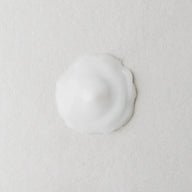 Twelve Beauty Prebiotic Natural Shine Conditioner texture swatch on a light gray background
