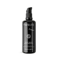 Twelve Beauty Glow Island Body Radiance Body Oil in a black bottle on a white background.