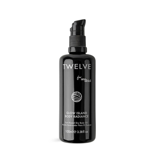Twelve Beauty Glow Island Body Radiance Body Oil in a black bottle on a white background.