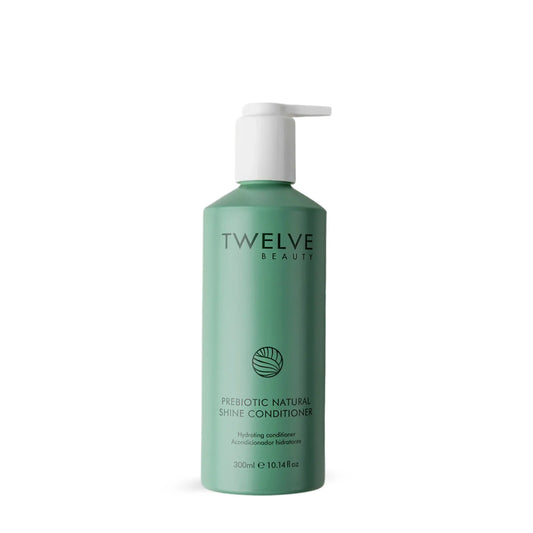 Twelve Beauty Prebiotic Natural Shine Conditioner in a green bottle on a white background