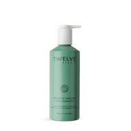 Twelve Beauty Prebiotic Natural Shine Shampoo in a green bottle with pump on a white background