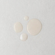 Twelve Beauty The Scalp Cure texture swatch on a gray surface