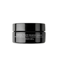Twelve Beauty Charcoal Peace Calming Cleanser in a black glass jar and a cap displayed on white background