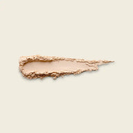 Uoga Uoga Happy Ending powder swatch on a light beige background