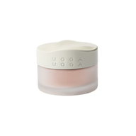 Uoga Uoga frosted glass cosmetic jar with Coral Charm blush powder inside and a white lid embossed set against a plain white background.