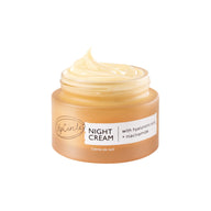 Open frosted amber glass jar of UpCircle Night Cream with hyaluronic acid and niacinamide, showing the swirled pale yellow cream inside.