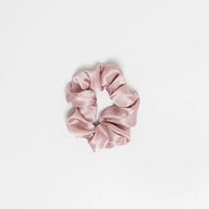 Hydra studio pink scrunchie on a light grey background